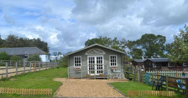 A la foto es mostra l'objecte Owls Nest Log Cabin situat a la ciutat de Morpeth.