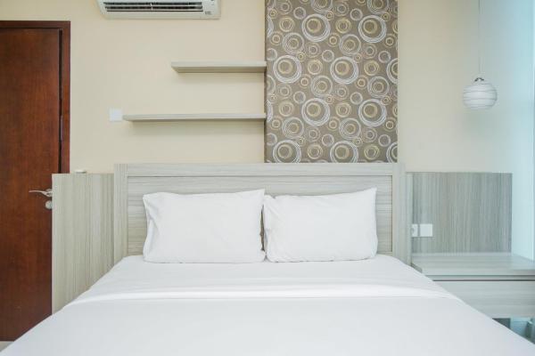 A la foto es mostra l'objecte Chic and Spacious 2BR Apartment at Brooklyn Alam Sutera By Travelio situat a la ciutat de Dongkal.