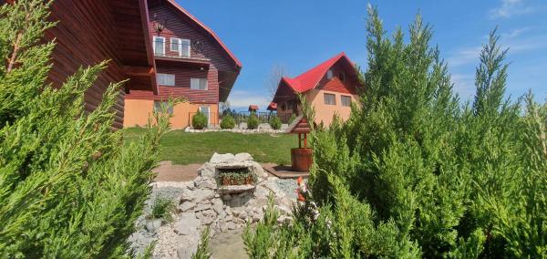 Na fotografii je vidět objekt Cabana Popasul Vânătorului nacházející se ve městě Arieşeni.