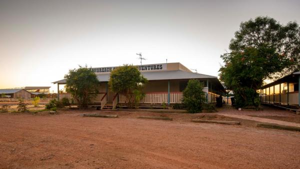 The photo shows the Outback Adventures Backpackers located in the city of Longreach.
