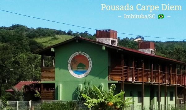 The photo shows the Pousada Carpe Diem located in the city of Imbituba.