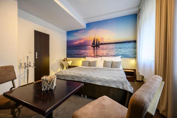 Na fotografii je vidět objekt Hotel U Šuláka nacházející se ve městě Kuřim.
