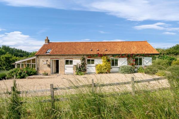 Na foto é possível ver o objeto Little Walk Cottage localizado na cidade de Grimsby.