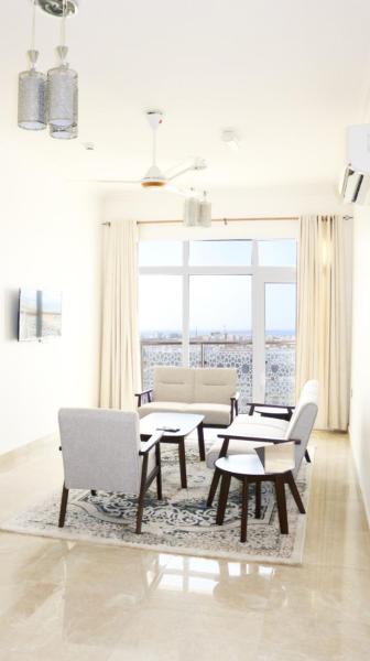 Kuvassa näkyy kohde Roza Hotel Apartments, joka sijaitsee kaupungissa Fatḩ Āl Bū Sa‘īd.