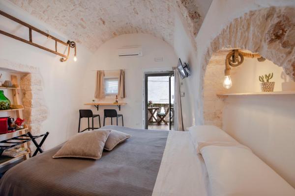 A la foto es mostra l'objecte CASA FLAMI' situat a la ciutat de Ostuni.