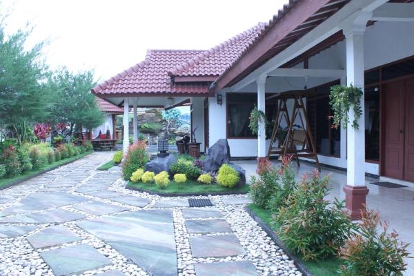 På bildet vises objektet Marry Ind Gunung Kawi Guest House Malang som ligger i byen Bumirejo.