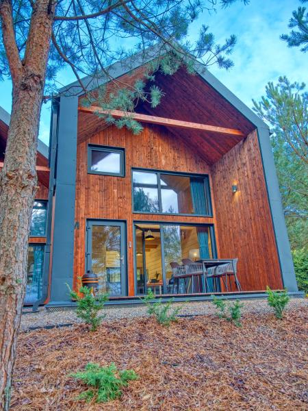 A la foto es mostra l'objecte Tleń Lodge - domy całoroczne z jacuzzi w cenie! situat a la ciutat de Tleń.