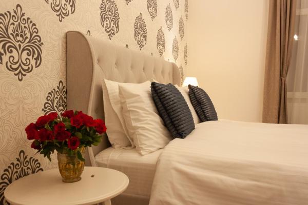 På billedet ses objektet Cozy Family Apartments beliggende i byen Braşov.