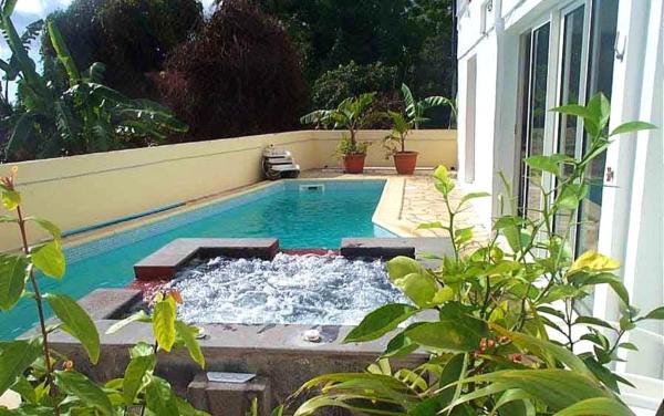 Appartement de 2 chambres avec piscine partagee jacuzzi et jardin clos a Bois De Nefles Saint Paul