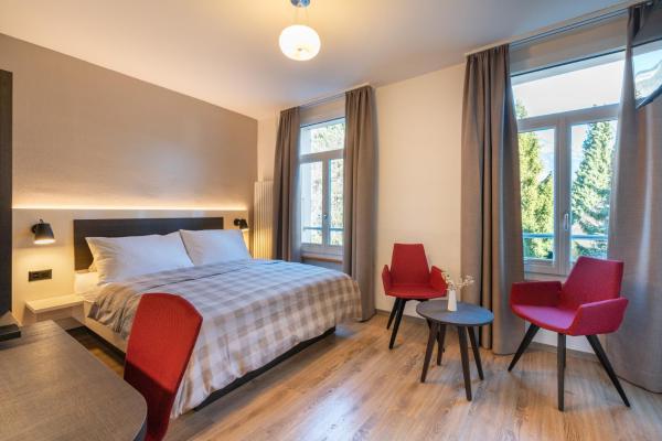 The photo shows the Hotel Derby Interlaken - self check-in located in the city of Interlaken.