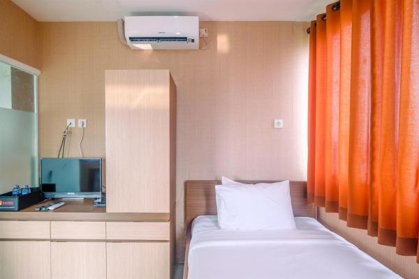 Op de foto is het object Compact and Simple Studio Apartment at Saladdin Mansion By Travelio te zien, gelegen in de stad Rawageni.