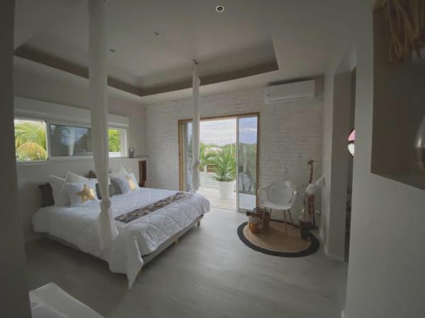 A la foto es mostra l'objecte Maison charmante au Moule avec jacuzzi situat a la ciutat de Le Moule.