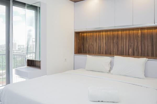 写真にはKedeper市にあるPremium Relaxing 2BR at Casa de Parco Apartment By Travelioが写っています。