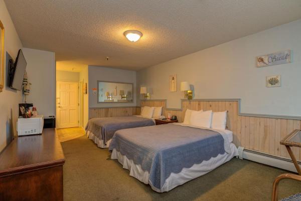 Na fotografii je vidět objekt Vacationland Inn & Suites nacházející se ve městě Brewer.