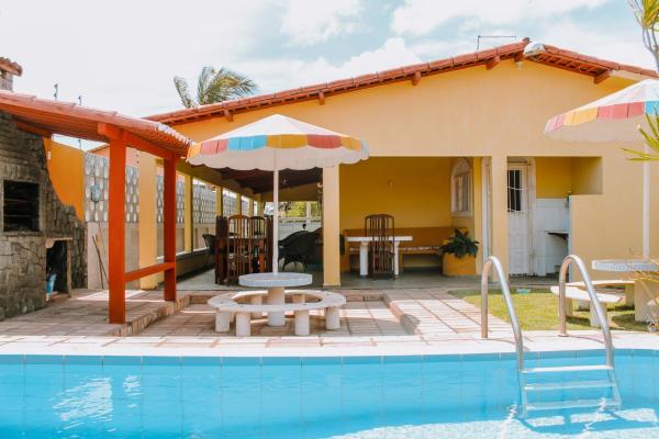 A la foto es mostra l'objecte Belíssima casa de temporada próximo ao mar situat a la ciutat de Natal.