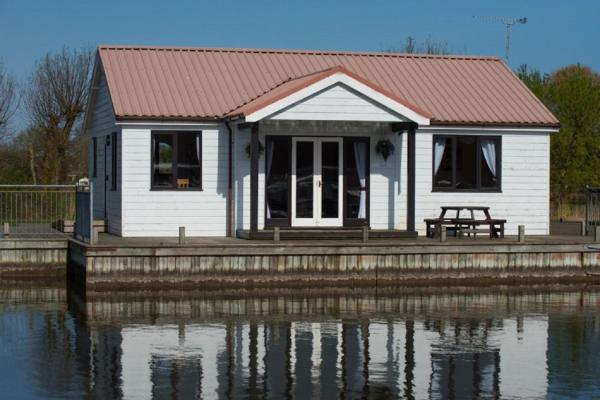 A la foto es mostra l'objecte Swift Cottage, Norfolk Broads situat a la ciutat de Potter Heigham.