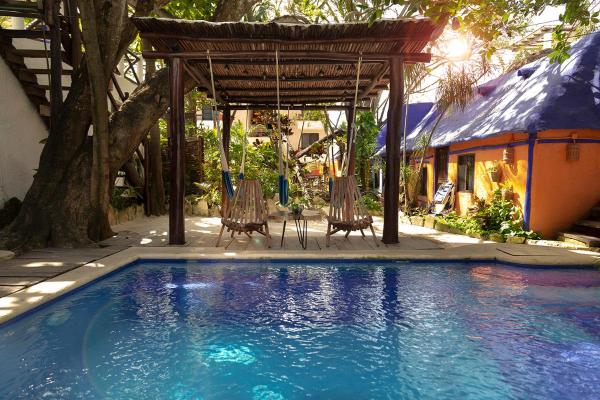 Nella foto è visibile l'oggetto Hotel Amar Inn situato nella città di Puerto Morelos.