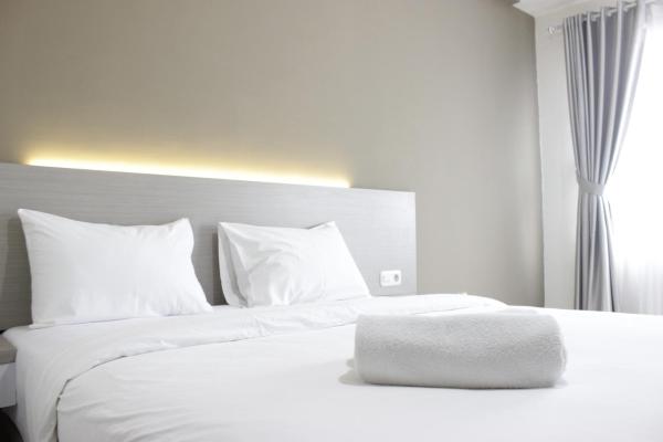 Kuvassa näkyy kohde Comfy Studio Apartment at Harvard Jatinangor near UNPAD By Travelio, joka sijaitsee kaupungissa Sayang.