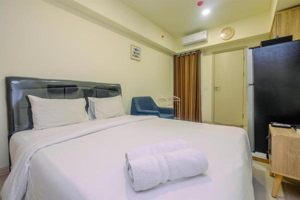 A la foto es mostra l'objecte Comfort and Strategic Studio Meikarta Apartment By Travelio situat a la ciutat de Cikarang.