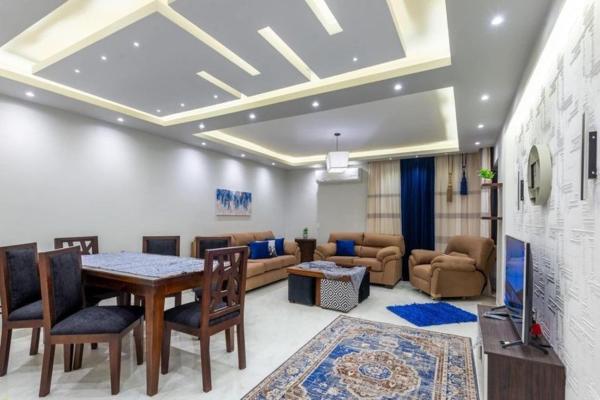 Na fotografii je vidět objekt New Apartment AlMohandessin near Shehab street nacházející se ve městě Káhira.