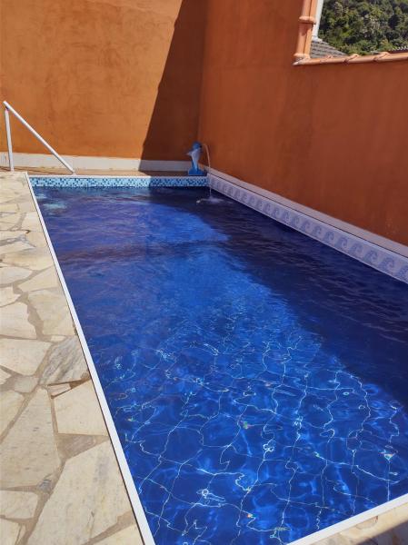 A la foto es mostra l'objecte Casa com Piscina em Ubatuba situat a la ciutat de Ubatuba.