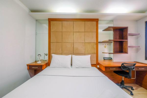 A la foto es mostra l'objecte Nice and Comfort 2BR Metropark Condominium Apartment By Travelio situat a la ciutat de Cikarang.