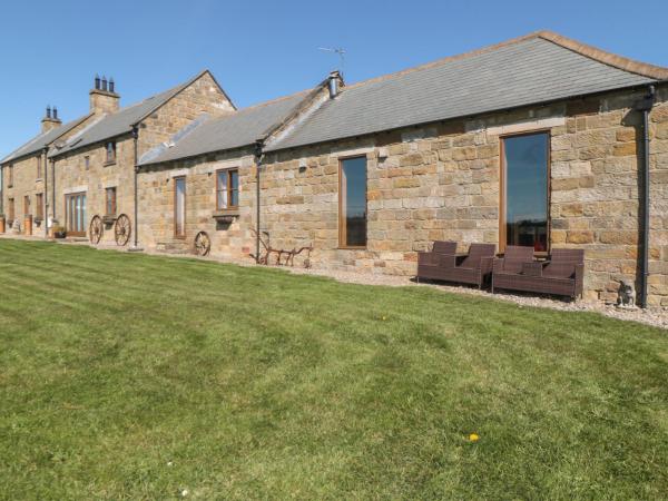 A la foto es mostra l'objecte Longstone Cottage situat a la ciutat de Mickleby.