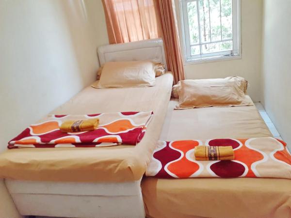 Na foto é possível ver o objeto Kost Carmelia Syariah Baranangsiang Bogor localizado na cidade de Bogor.