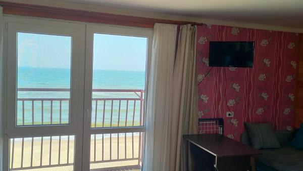 Фотографии отеля: Апартаменты в первой линии с видом на море, Затока