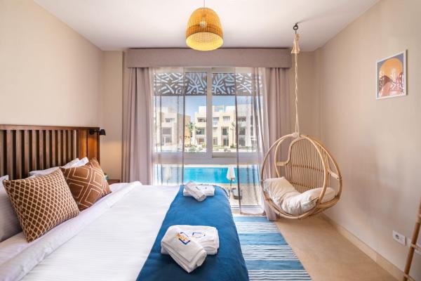 Auf dem Foto ist das Objekt Epic & Exquisite 2 BR w Beach & Pool Mangroovy in der Stadt Hurghada zu sehen.