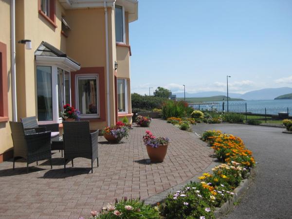 The photo shows the Coastline House located in the city of Milltown.