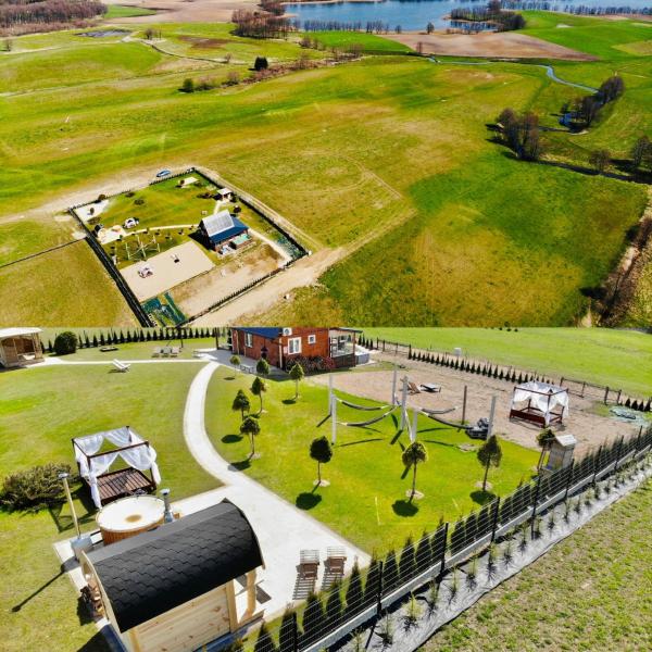 Auf dem Foto ist das Objekt Domek z basenem na Mazurach in der Stadt Giże zu sehen.