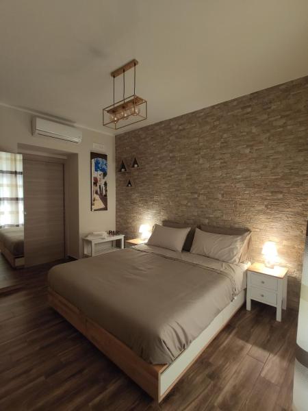A la foto es mostra l'objecte Tizzy Apartment & Rooms situat a la ciutat de Bari.