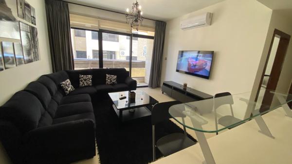 På billedet ses objektet Dair Ghbar Apartment beliggende i byen Amman.