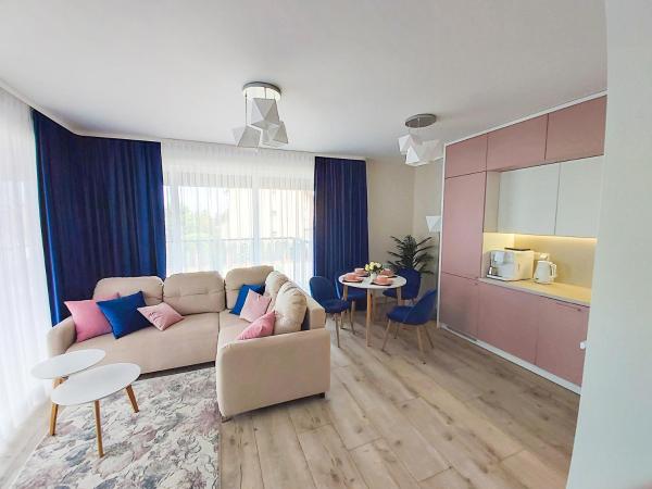 Na zdjęciu widoczny jest obiekt Apartament Bella Rosa z podziemnym parkingiem położony w mieście Zagórze.