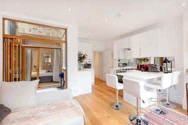 Foto 7: Fulham Broadway 2-Bed Apt w Garden & Pets Ok
