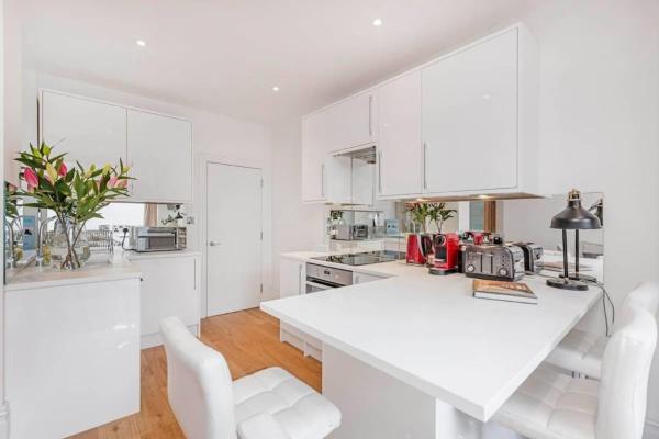 Foto 4: Fulham Broadway 2-Bed Apt w Garden & Pets Ok