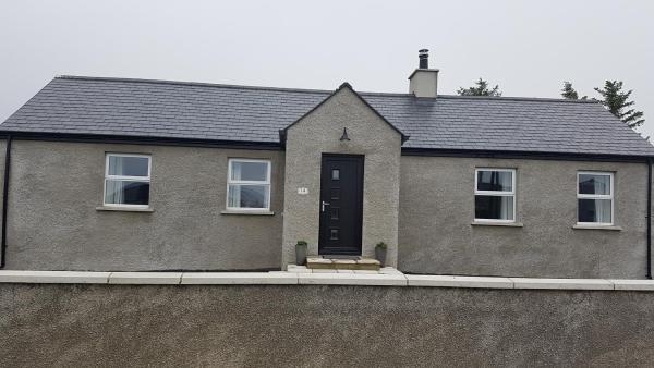 The photo shows the Country Views The Wee Hoose located in the city of Dunseverick.