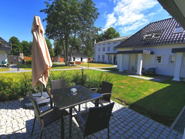 A la foto es mostra l'objecte Kavaliershaus Henriettenhof situat a la ciutat de Grömitz.