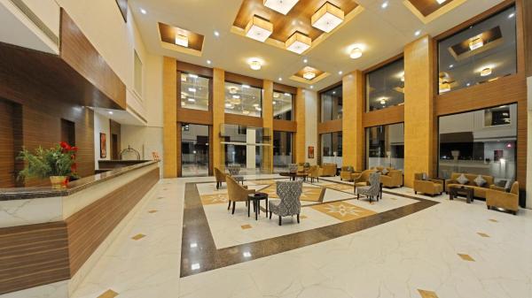 The photo shows the Poppys Hotel Madurai located in the city of Melūr.