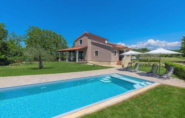 A la foto es mostra l'objecte Holiday House Vita situat a la ciutat de Tinjan.