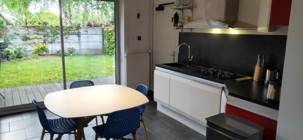 På billedet ses objektet Maison confortable à Vieux-Condé avec jardin privé et parking beliggende i byen Lorette.
