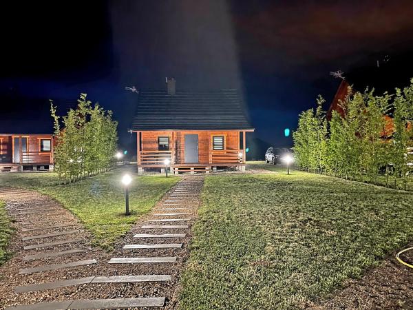 Na fotografii je vidět objekt Domki Mazurskie Zacisze Jeziora Sunowo nacházející se ve městě Rękusy.