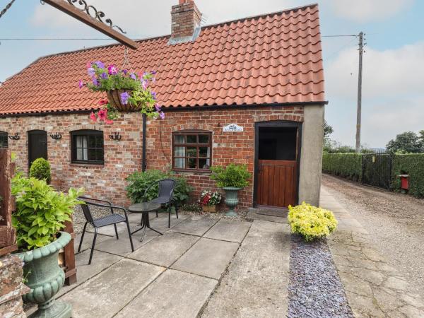 A la foto es mostra l'objecte Woldsend Cottage situat a la ciutat de Hemingby.