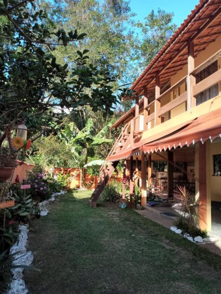 The photo shows the Pousada do Bote - Apart Suítes em 