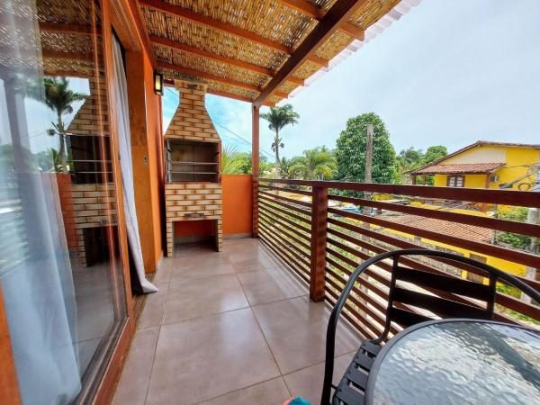 A la foto es mostra l'objecte Cedro - Flat recém inaugurado, 50mts da Praia, Churr, Piscina, WiFi eficiente, Netflix situat a la ciutat de Parati.