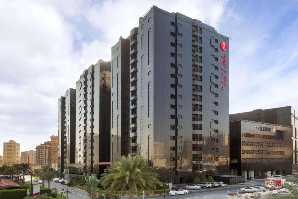 The photo shows the Ramada Hotel & Suites by Wyndham Ajman located in the city of Ajman .