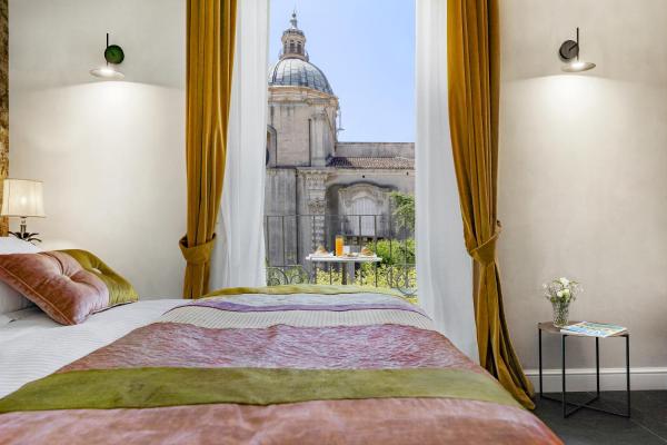 Na foto é possível ver o objeto Relais Antica Badia - San Maurizio 1619 localizado na cidade de Ragusa.