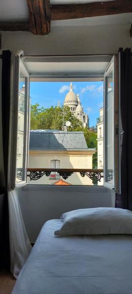 På bildet vises objektet Le Village Montmartre som ligger i byen Paris.