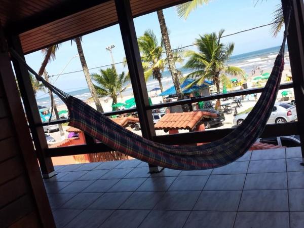 A la foto es mostra l'objecte Casa Beira-Mar em Mongaguá - 4 Quartos - Vista Inesquecível para o Mar - Wi-Fi - Estacionamento 4 carros situat a la ciutat de Mongaguá.